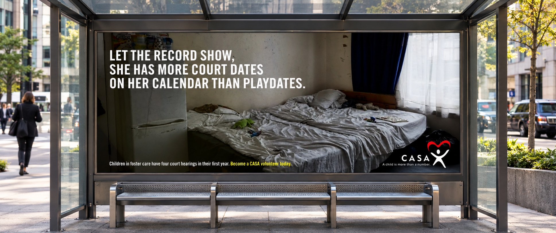 Mockup of the court dates ad in a bus shelter.